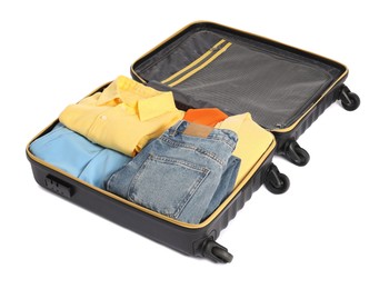 Photo of Open suitcase with clothes packed for travelling isolated on white