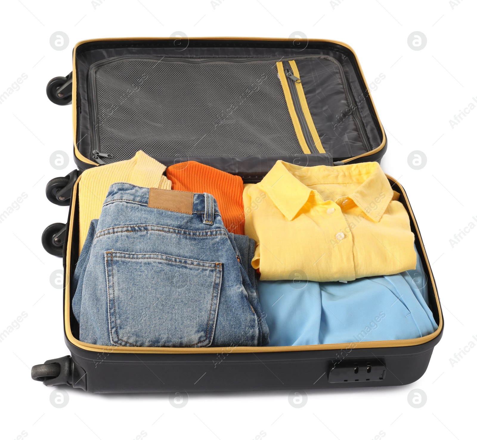 Photo of Open suitcase with clothes packed for travelling isolated on white