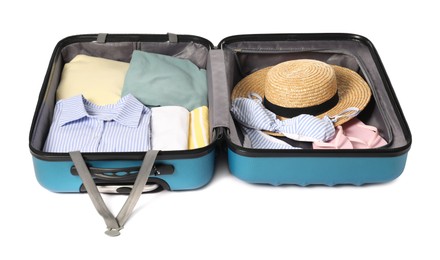 Photo of Open suitcase with clothes packed for travelling isolated on white