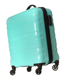 One new turquoise suitcase isolated on white