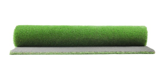 Photo of Roll of green artificial grass isolated on white