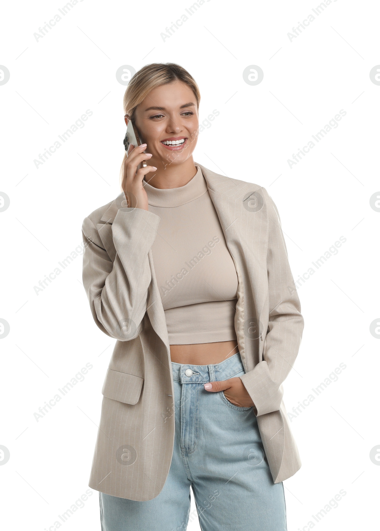 Photo of Beautiful woman in stylish jacket talking on smartphone against white background