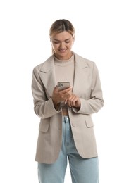 Beautiful woman in stylish jacket using smartphone on white background