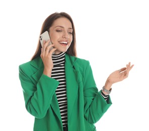 Beautiful woman in stylish green jacket talking on phone against white background