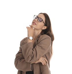 Beautiful woman in stylish brown jacket, glasses and black dress on white background