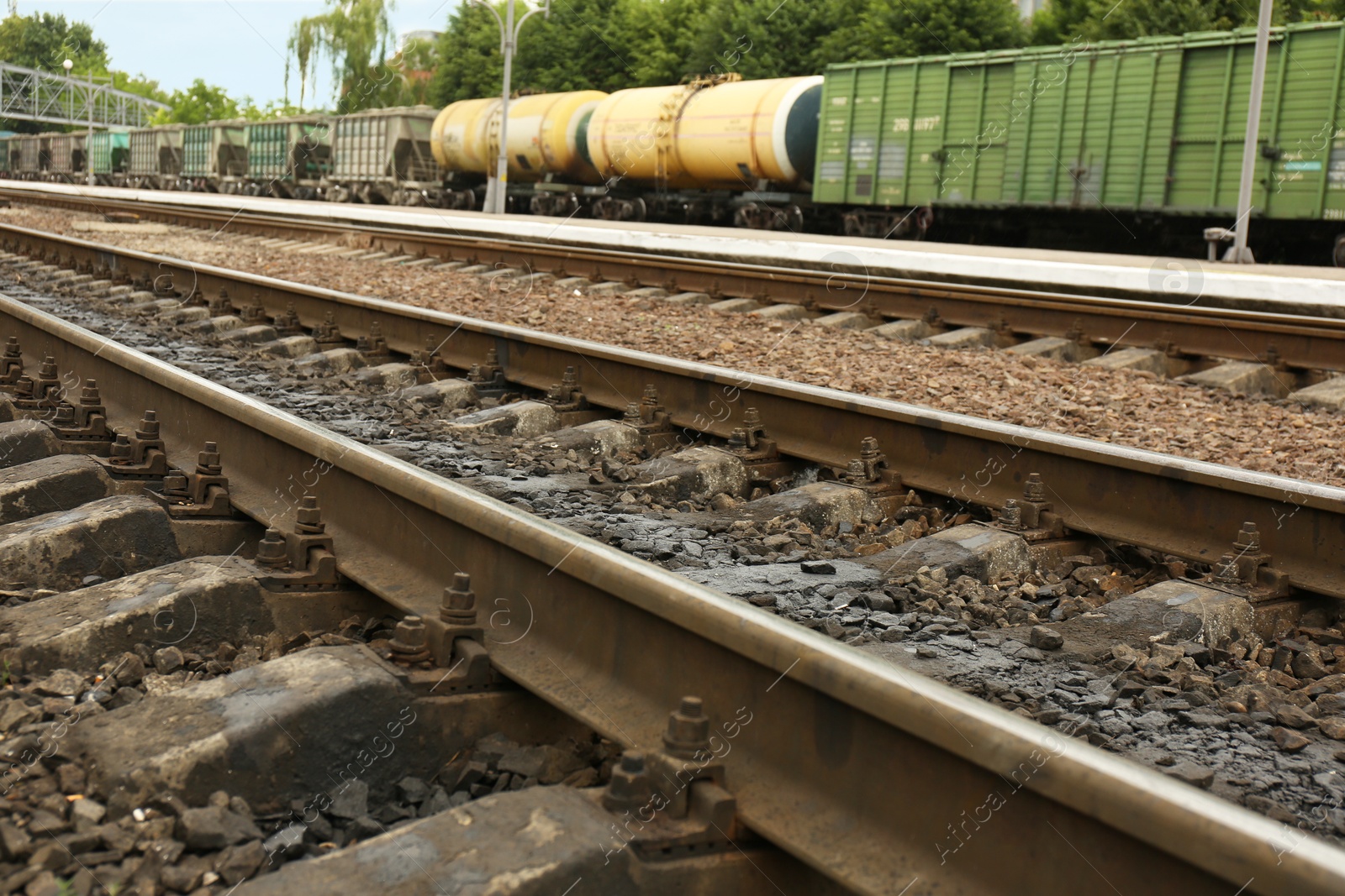 Photo of Metal railway lines outdoors in city, closeup view