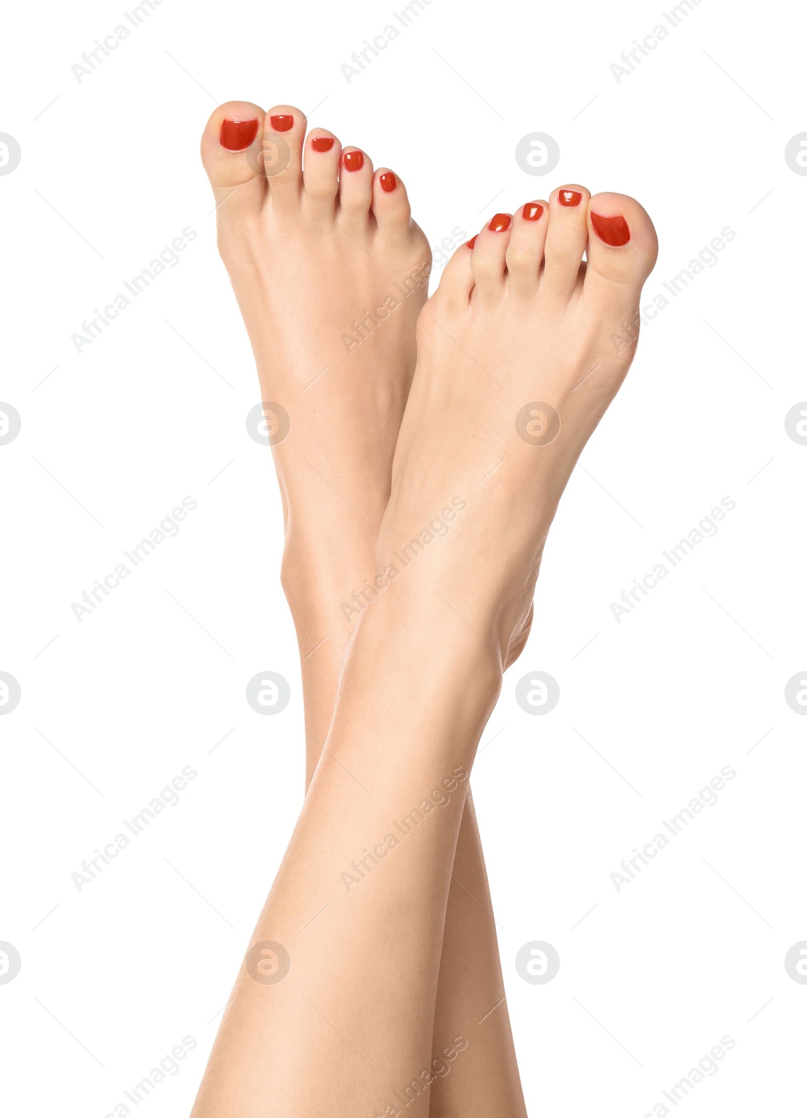 Image of Pedicure. Woman showing toenails covered with red nail polish on white background, closeup