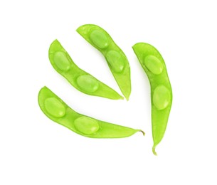 Photo of Raw green edamame pods with soybeans isolated on white, top view