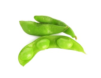 Photo of Raw green edamame pods with soybeans isolated on white, top view