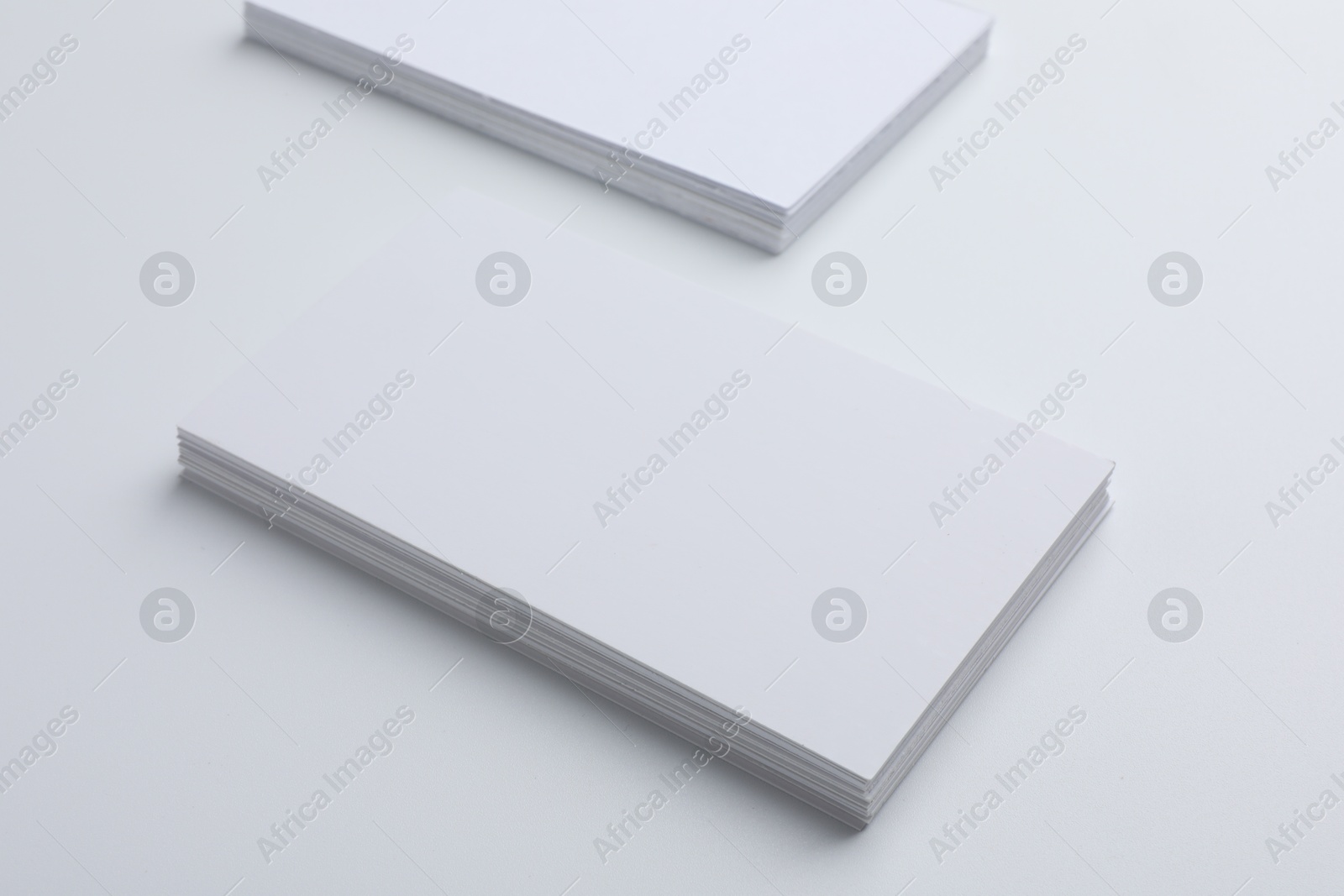 Photo of Blank business cards on light grey background. Mockup for design