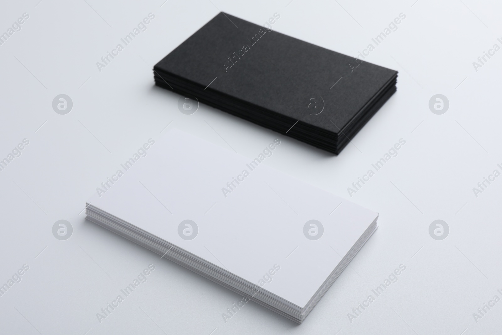 Photo of Blank business cards on light grey background. Mockup for design