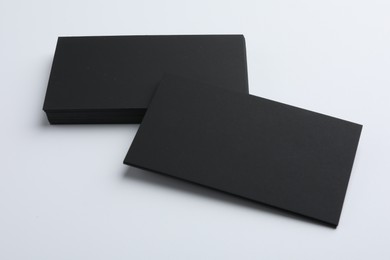 Photo of Blank business cards on light grey background. Mockup for design