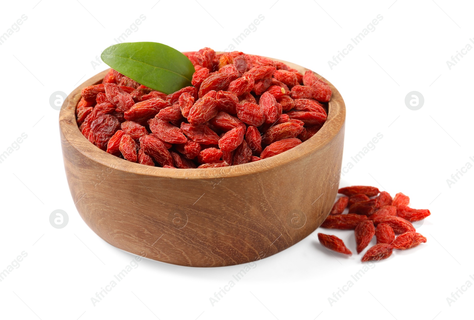 Photo of Dried goji berries and leaf in bowl isolated on white