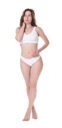 Woman with slim body posing on white background