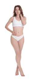 Photo of Woman with slim body posing on white background