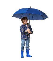 Photo of Little boy with blue umbrella on white background