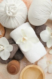 Photo of Flat lay composition with different spa products on beige textured background