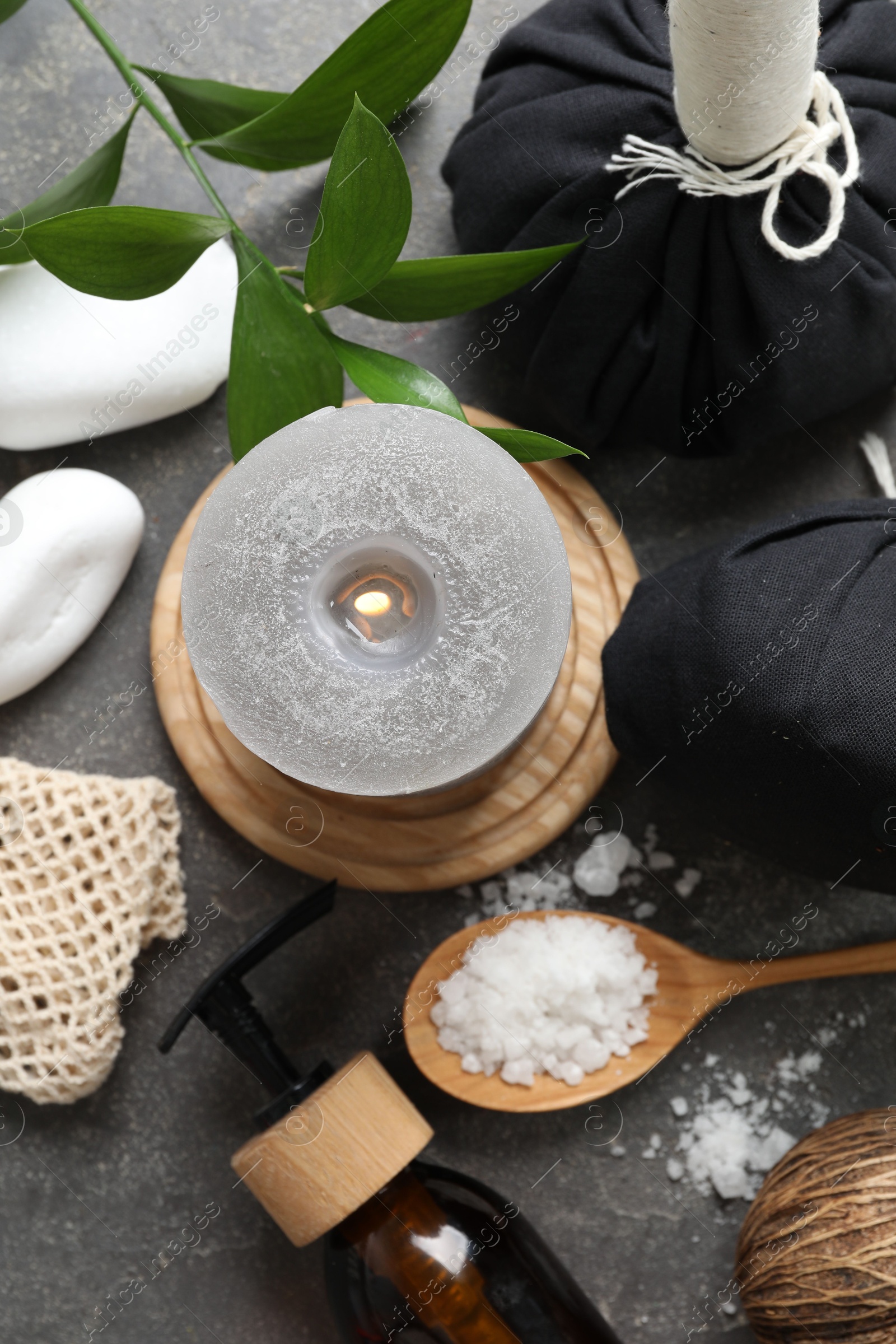 Photo of Flat lay composition with different spa products on grey textured table