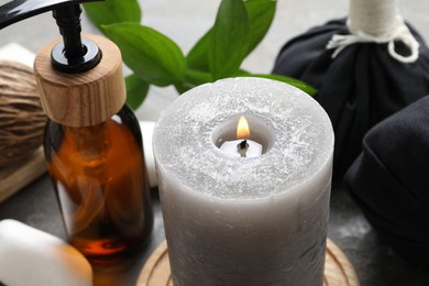 Spa composition with different products on grey table, closeup