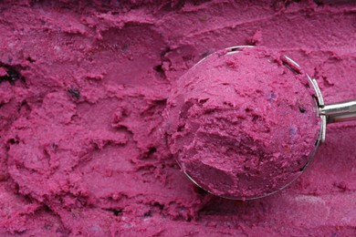 Scoop of tasty berry sorbet, closeup. Space for text