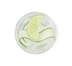 Refreshing water with sliced cucumber and lime in glass isolated on white, top view