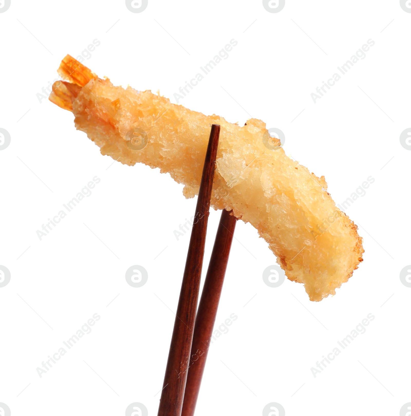 Photo of Chopsticks with delicious breaded fried shrimp isolated on white