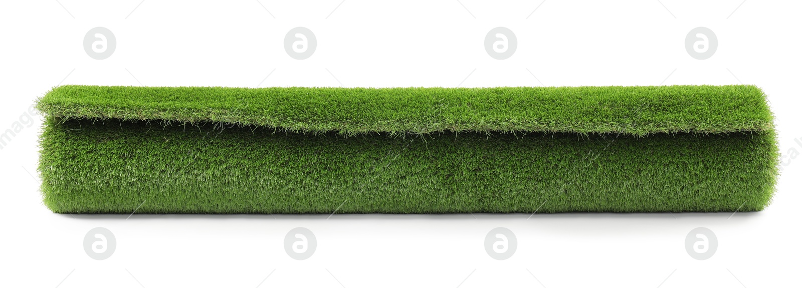 Photo of Roll of green artificial grass isolated on white