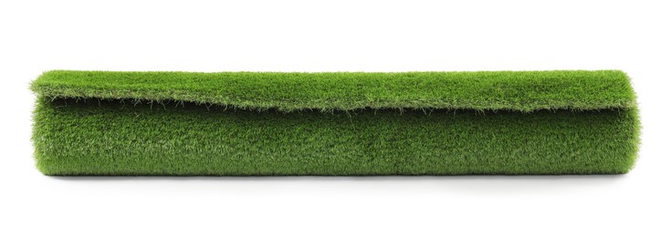 Photo of Roll of green artificial grass isolated on white