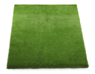 Green artificial grass isolated on white, top view