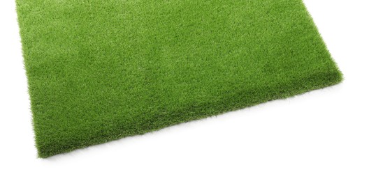 Green artificial grass isolated on white, top view