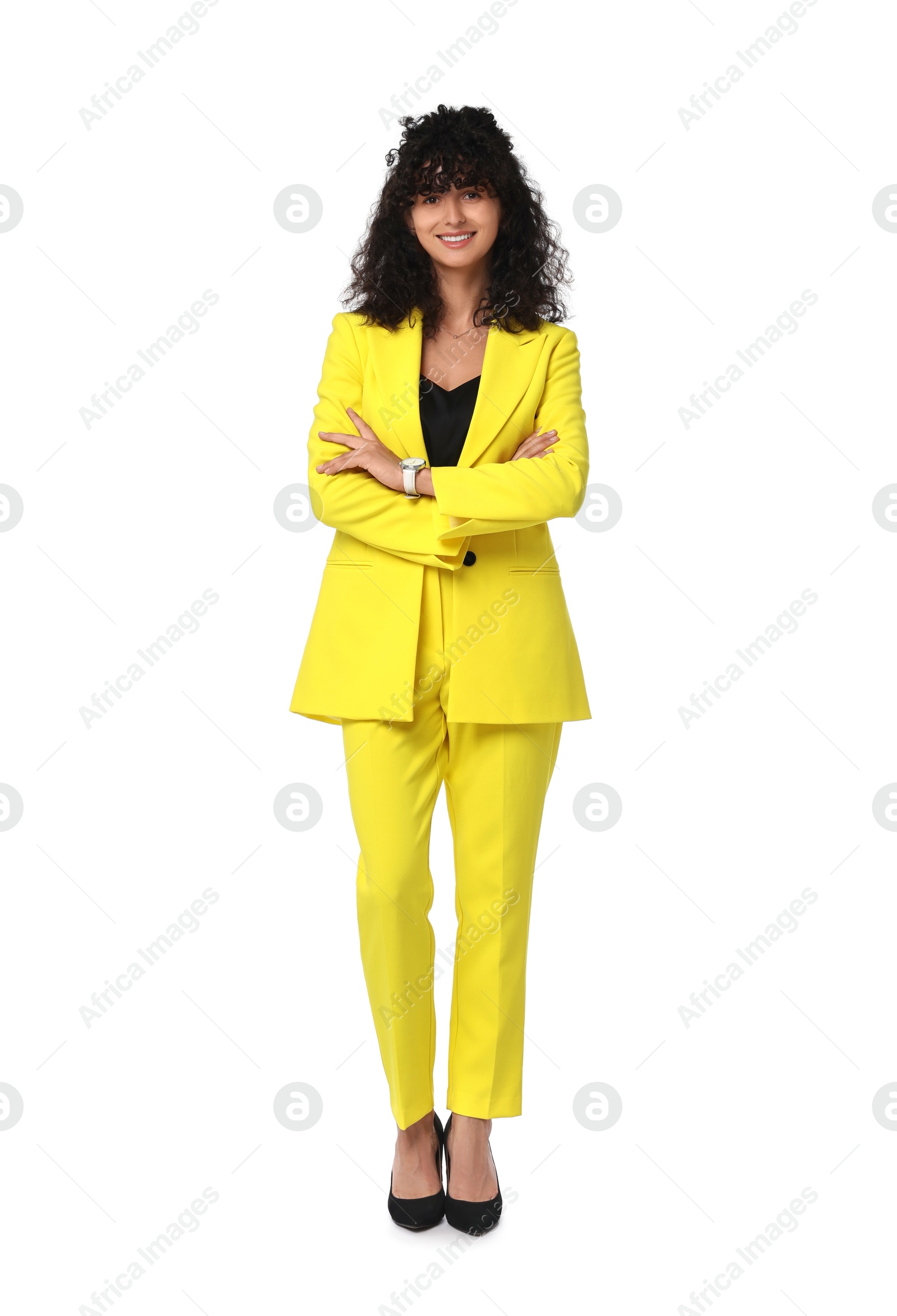 Photo of Beautiful young woman in stylish yellow suit isolated on white