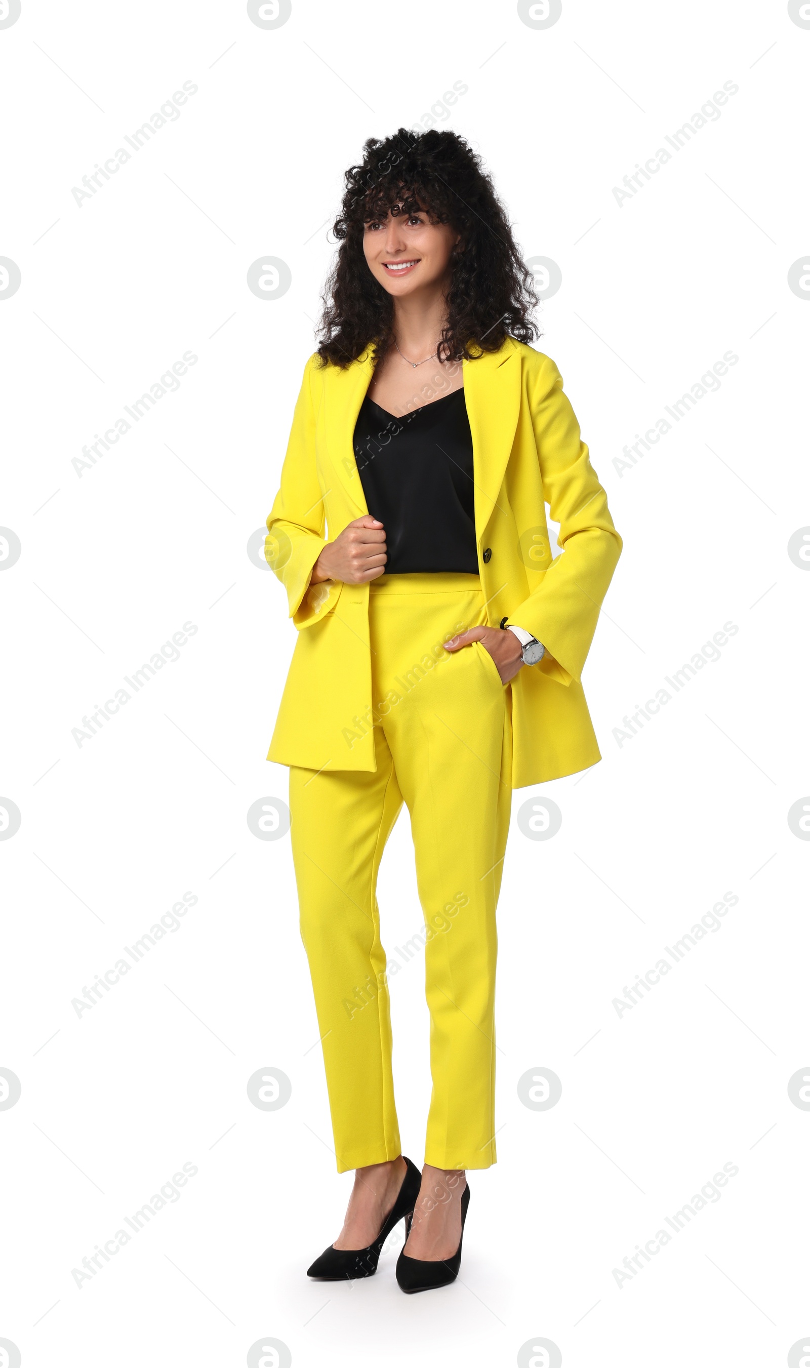 Photo of Beautiful young woman in stylish yellow suit isolated on white