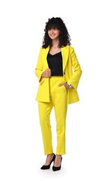 Photo of Beautiful young woman in stylish yellow suit isolated on white