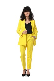 Photo of Beautiful young woman in stylish yellow suit isolated on white