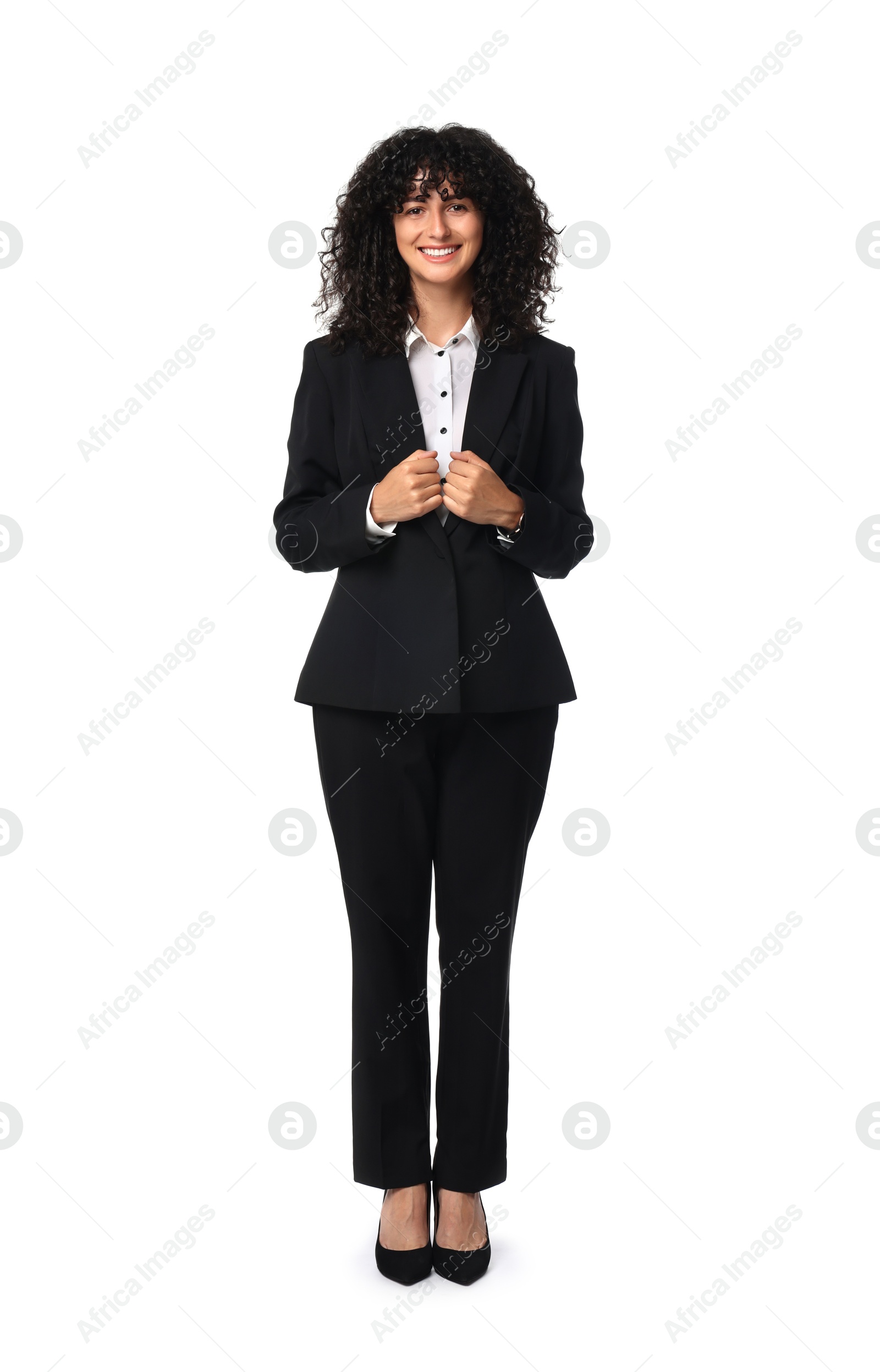 Photo of Beautiful young woman in black suit isolated on white