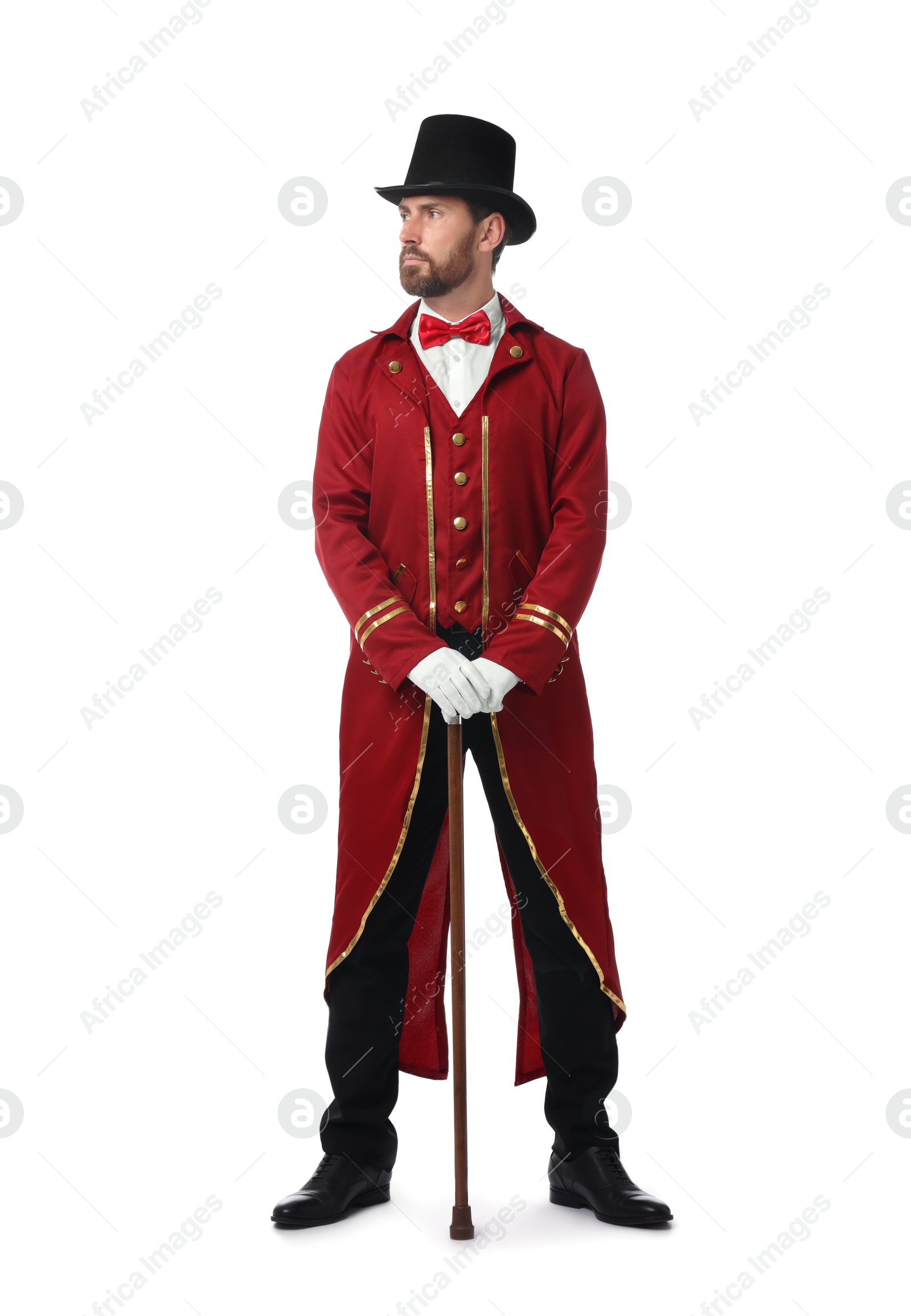 Photo of Portrait of showman in red costume and hat on white background