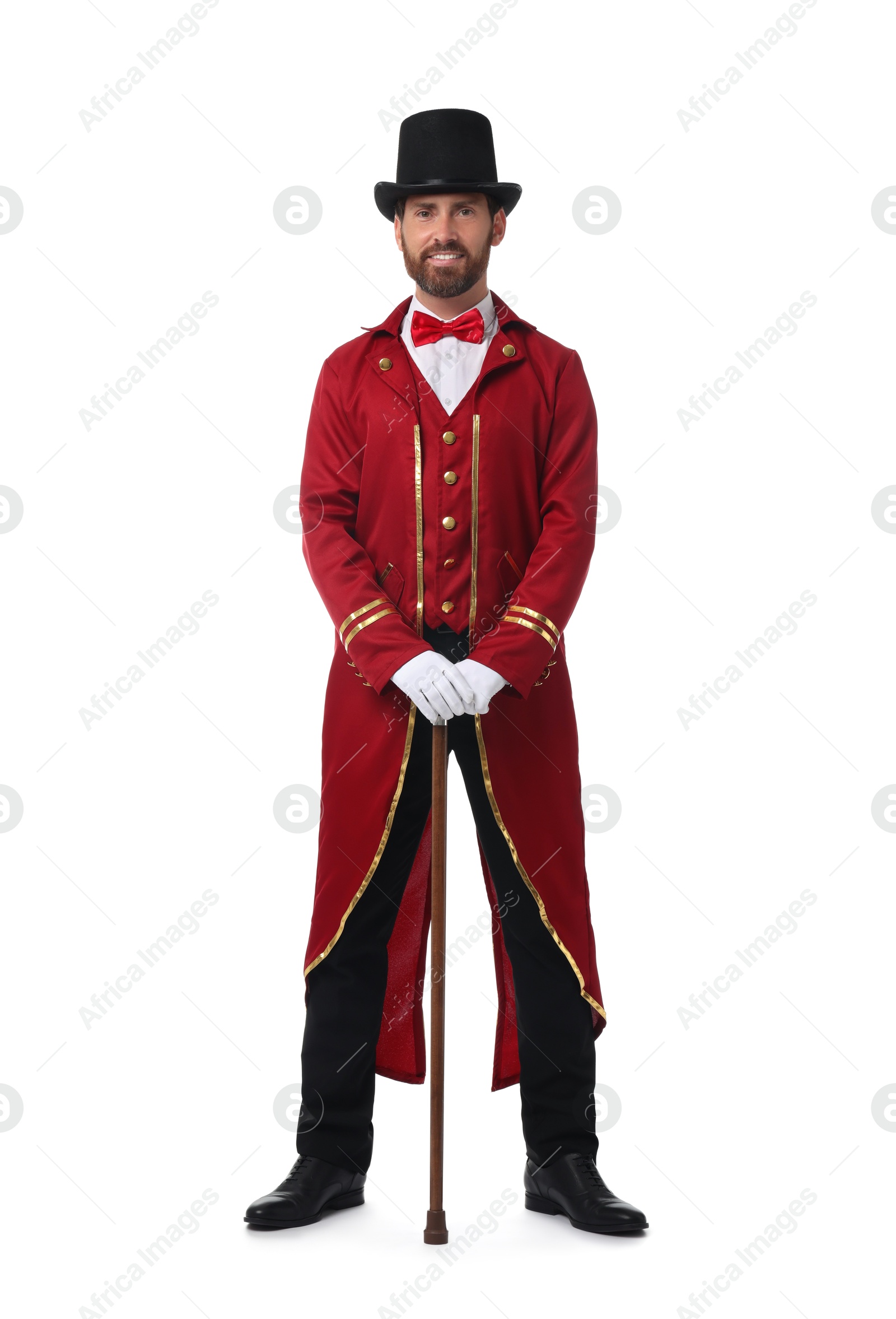 Photo of Portrait of showman in red costume and hat on white background