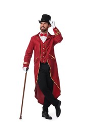 Photo of Portrait of showman in red costume and hat on white background