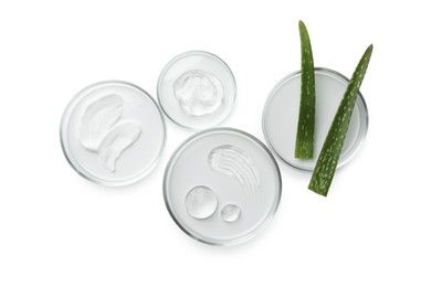 Petri dishes with different cosmetic products and aloe vera leaves isolated on white, flat lay