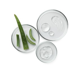 Petri dishes with different cosmetic products and aloe vera leaves isolated on white, flat lay