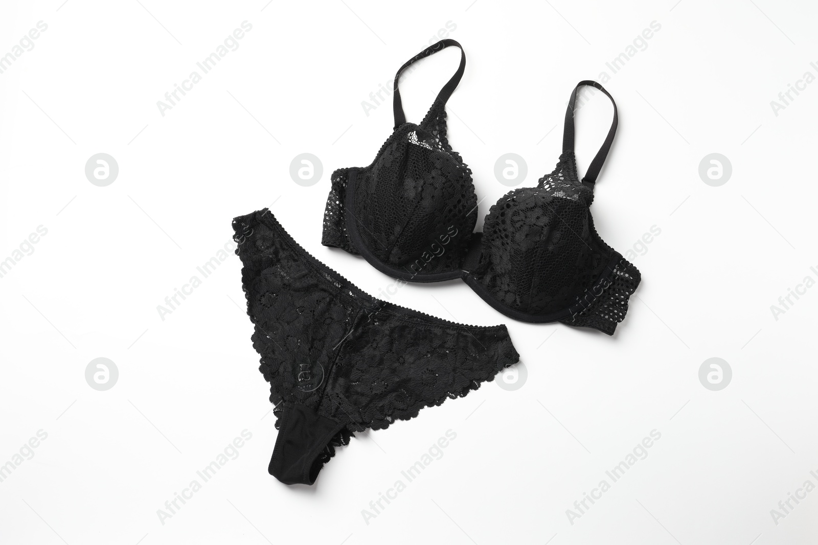 Photo of Elegant black lace women's underwear isolated on white, top view