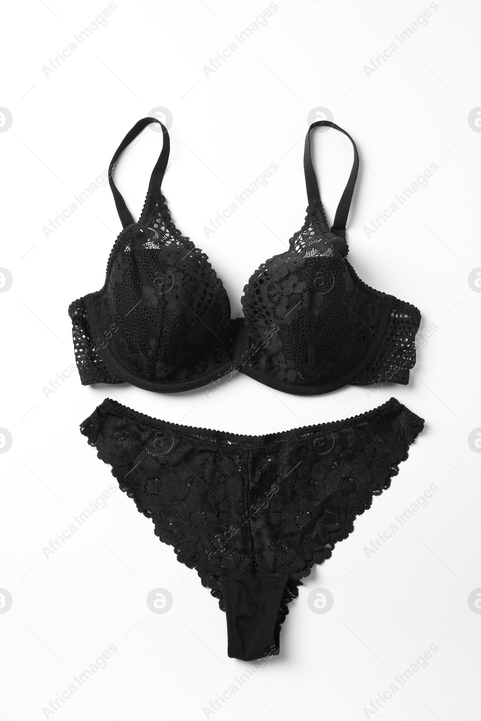 Photo of Elegant black lace women's underwear isolated on white, top view