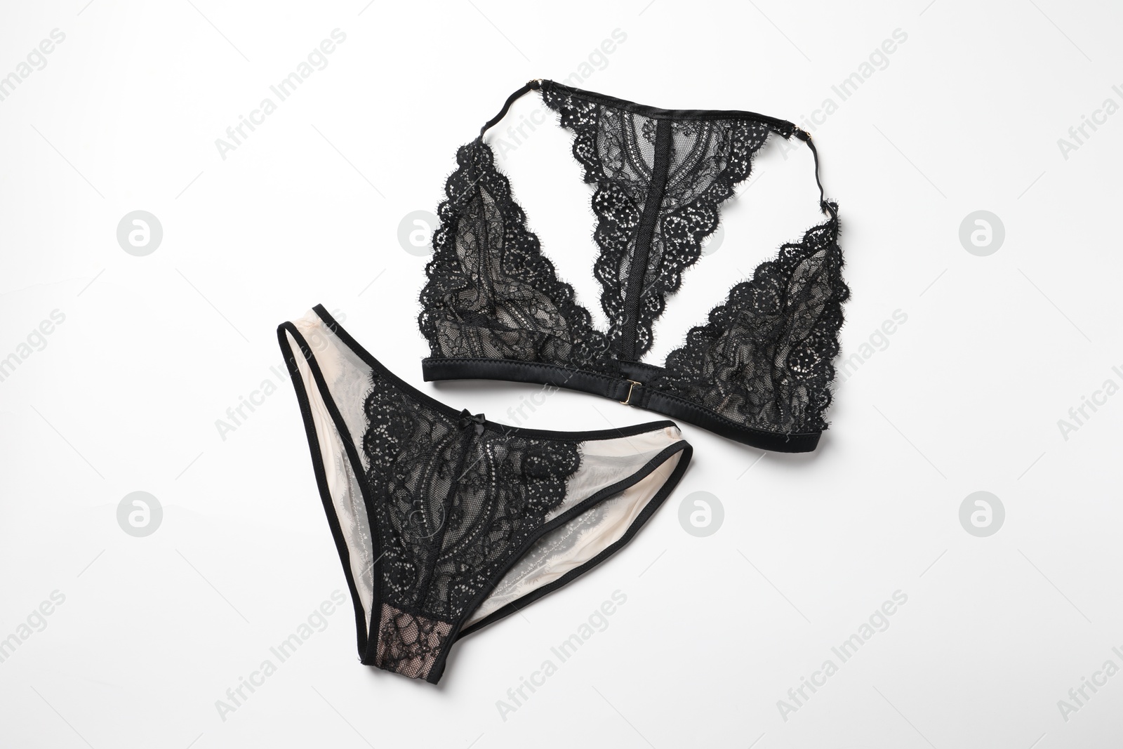 Photo of Elegant black lace women's underwear isolated on white, top view