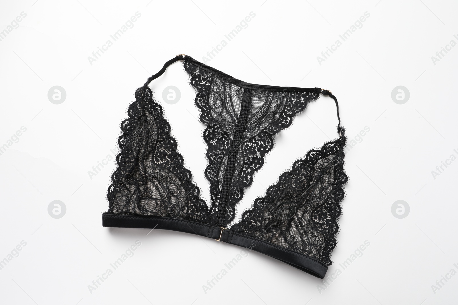 Photo of Elegant black lace women's underwear isolated on white, top view