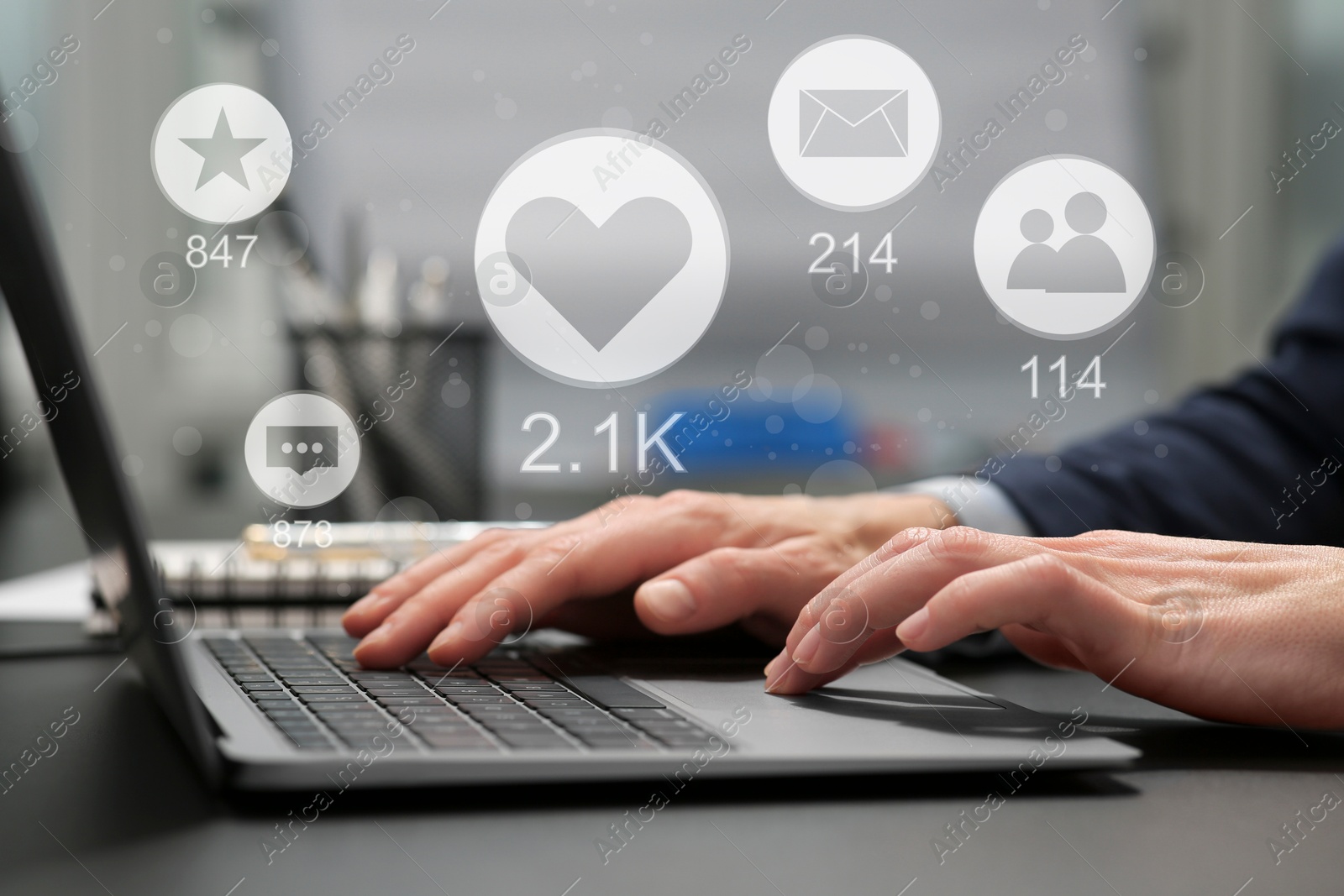 Image of Content manager. Woman working on laptop indoors, closeup. Likes, followers, e-mails, messages and adding to favorite notifications over device