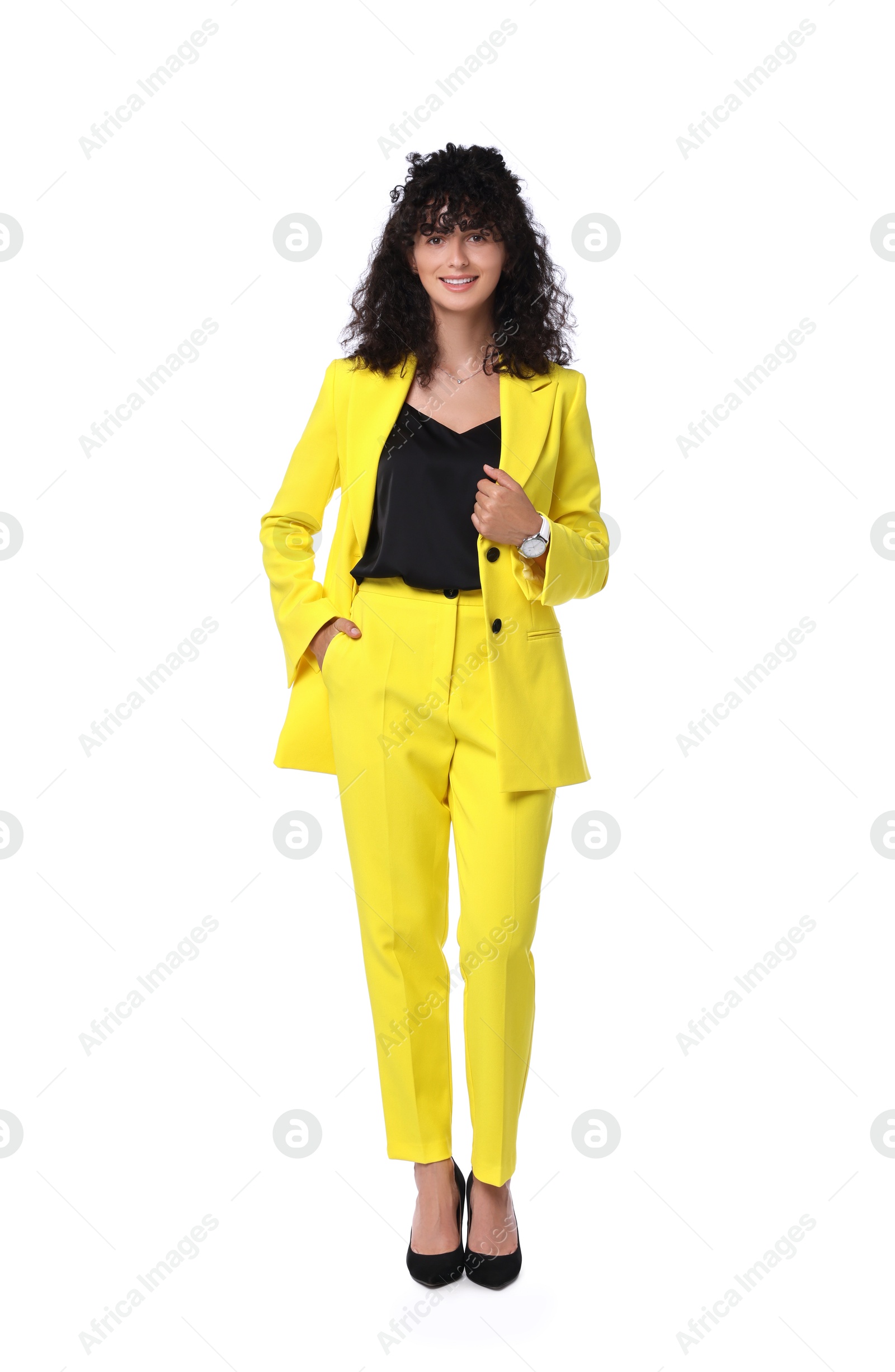 Photo of Beautiful young woman in stylish yellow suit isolated on white