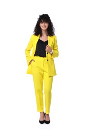 Photo of Beautiful young woman in stylish yellow suit isolated on white