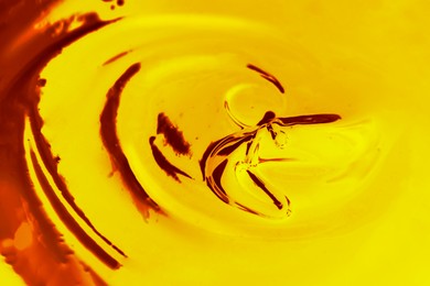 Image of Texture of gold fluid as background, closeup