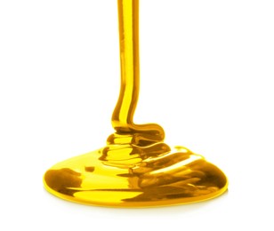 Pouring gold fluid on white background. Bright liquid