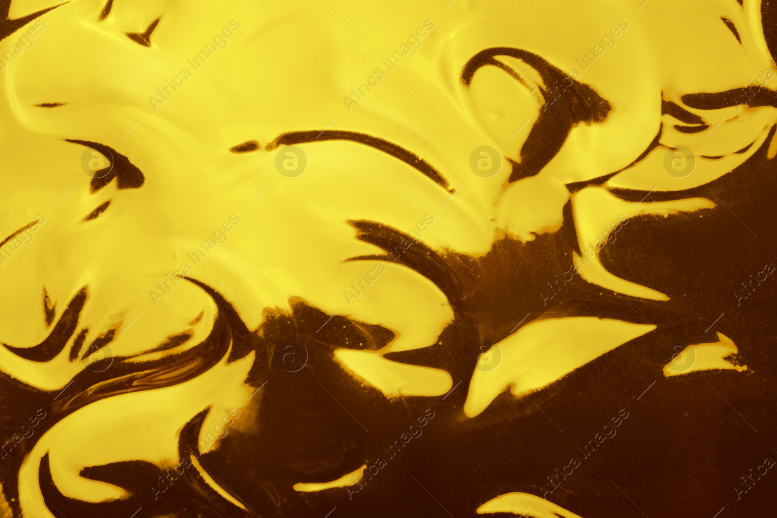 Image of Texture of gold fluid as background, closeup